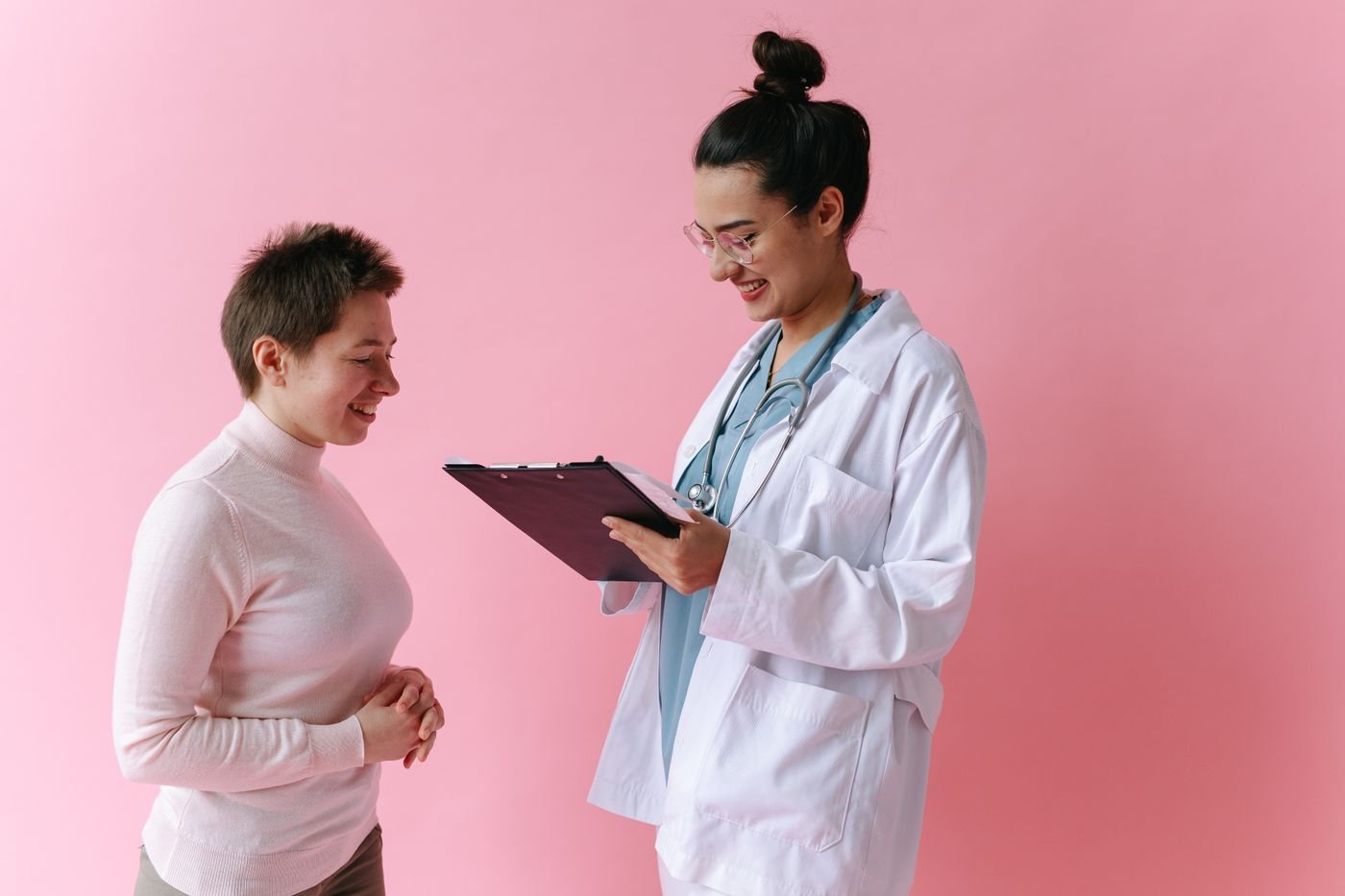 Doctor consulting with a patient across a desk